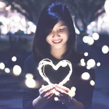 woman heart The ONE Secret To Keeping A Guy Interested In You